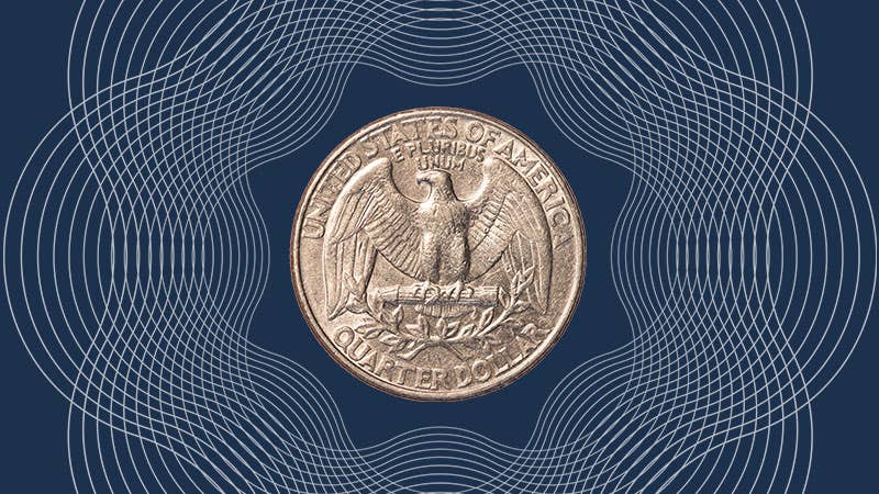 The tails of a quarter on a blue background