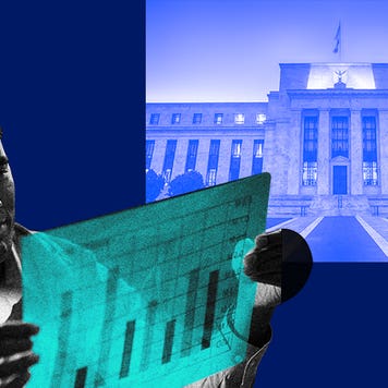 Man looking at bar graph amid Federal Reserve Eccles Building