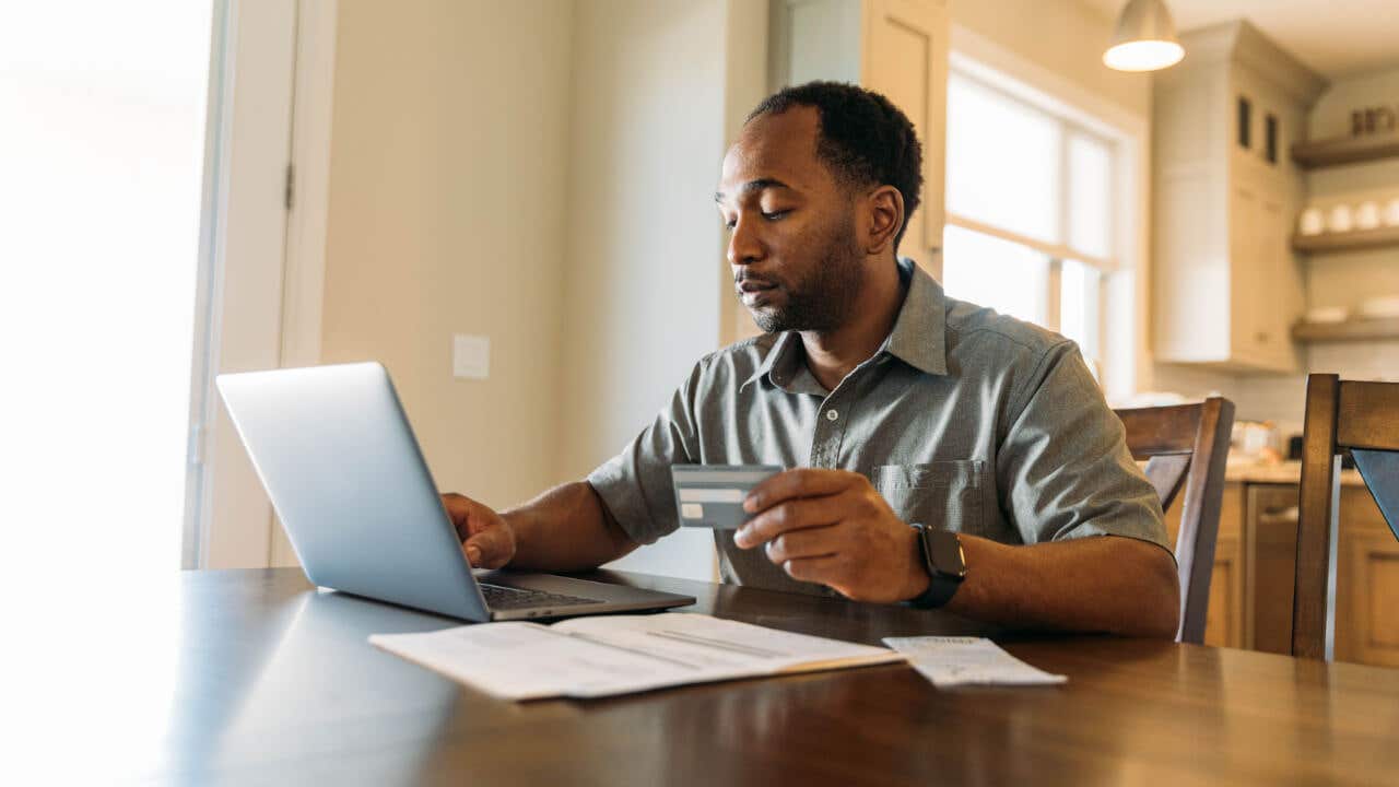 Man paying bills online