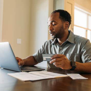 Man paying bills online