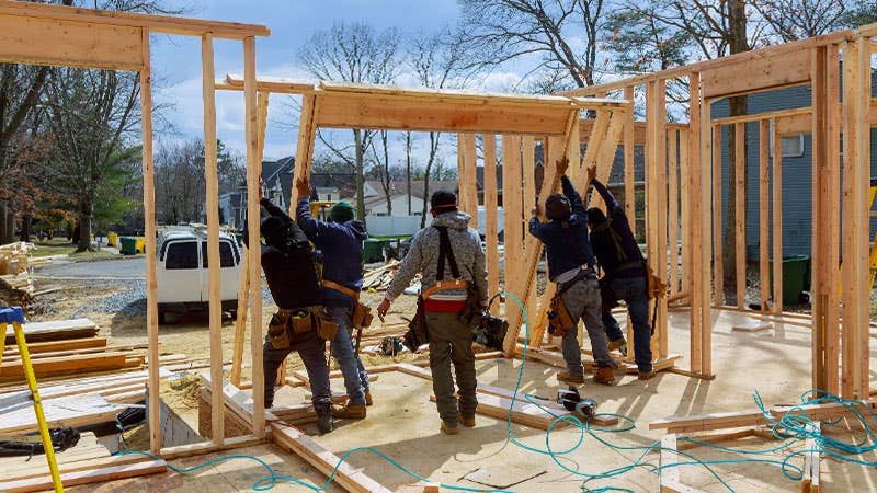 Men building home