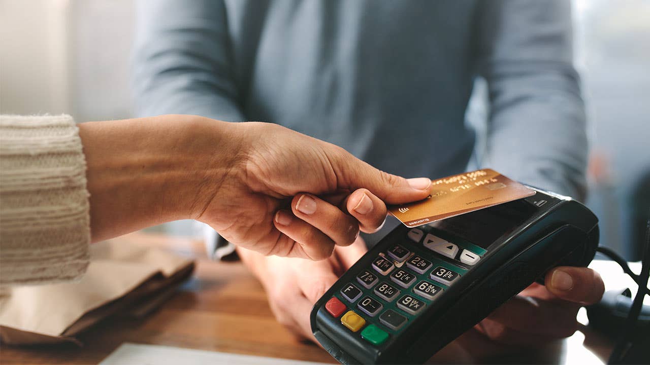 Woman makes a credit card payment