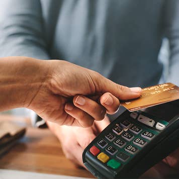 Woman makes a credit card payment