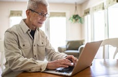 Man looking at credit card options online