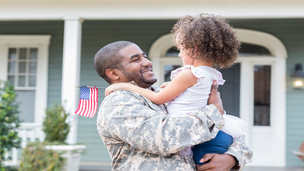 Veteran father with young daughter