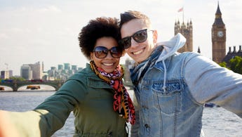 Young couple take a selfie on vacation in London