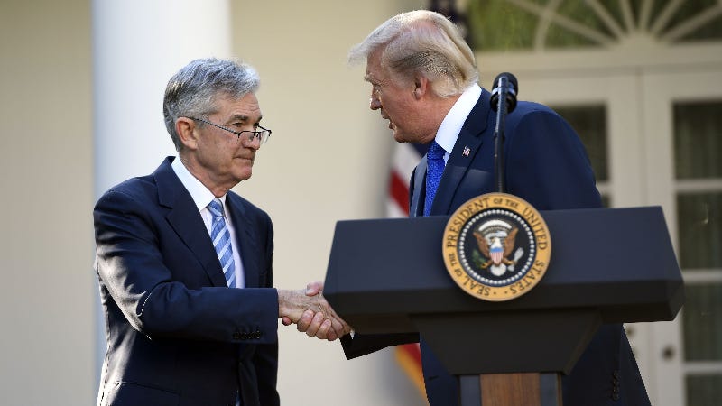 President Donald Trump shakes the hand of Fed Chairman Jerome Powell