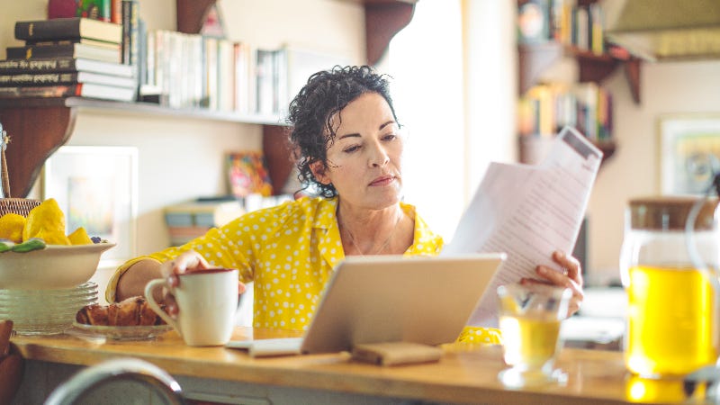 Woman looking through documents