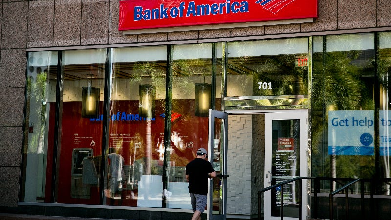 A customer enters a Bank of America location