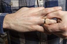 Man removing wedding ring