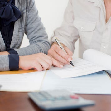 Person signing paperwork