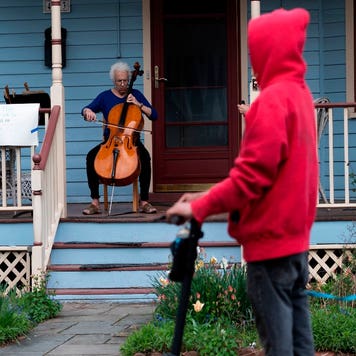 Cellist plays on porch during coronavirus