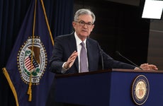 Federal Reserve Chairman Jerome Powell talks to reporters at press conference