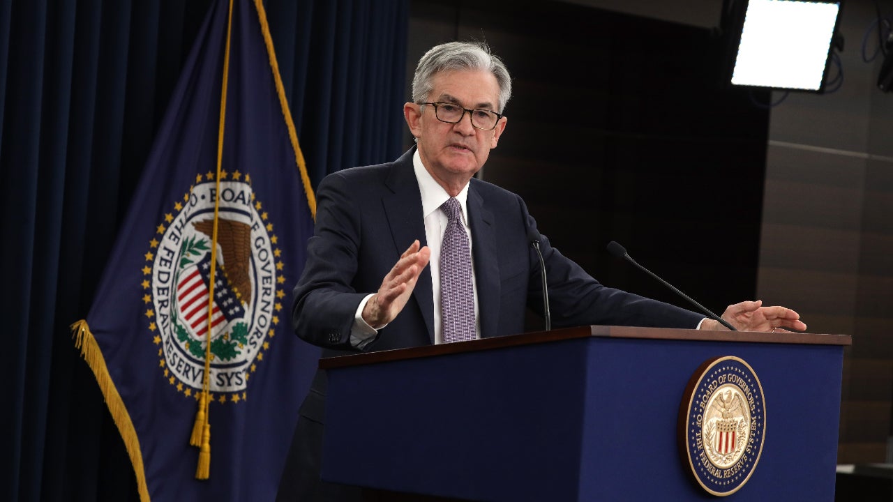 Federal Reserve Chairman Jerome Powell talks to reporters at press conference