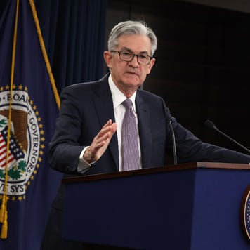 Federal Reserve Chairman Jerome Powell talks to reporters at press conference