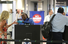 Woman going through airport security