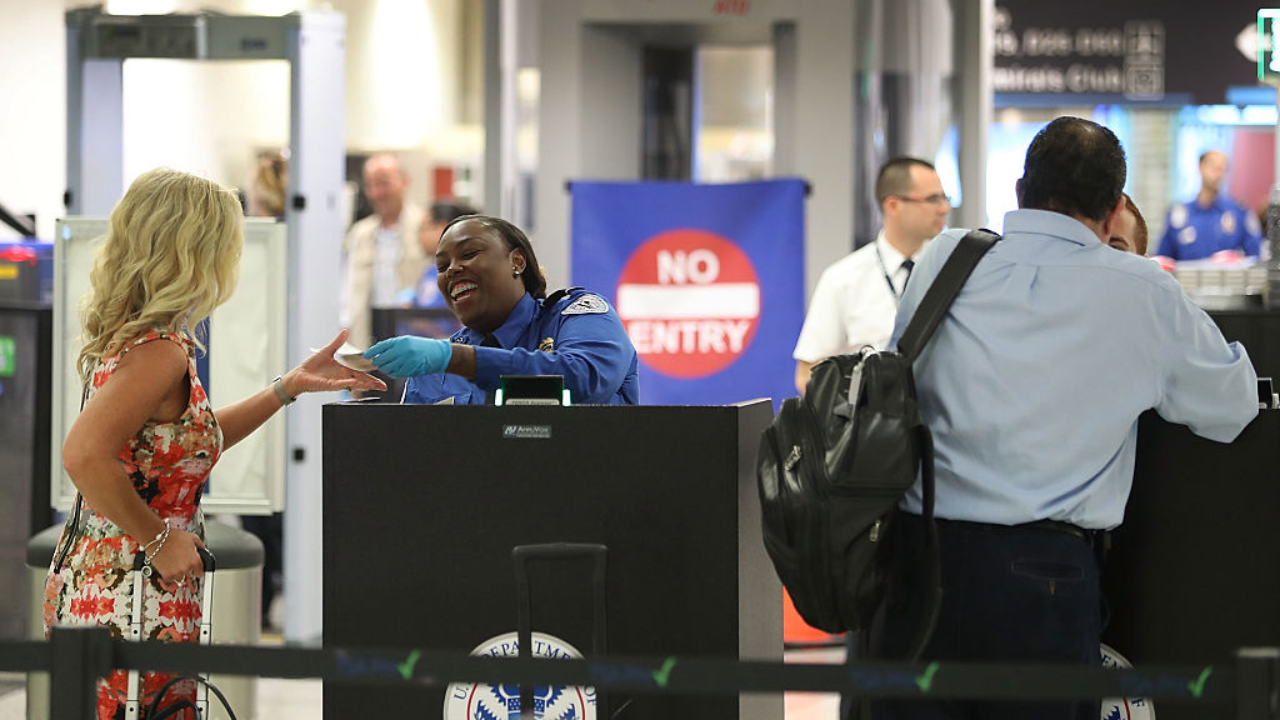 Woman going through airport security