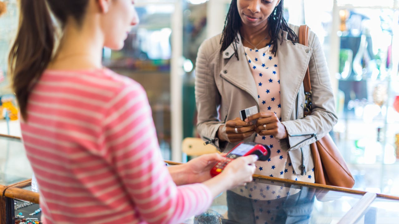 Person paying with credit card