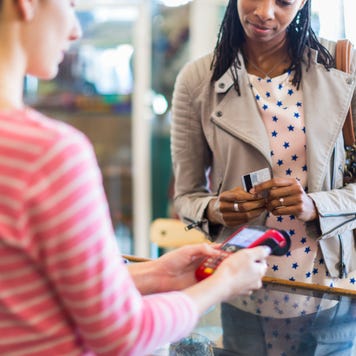 Person paying with credit card
