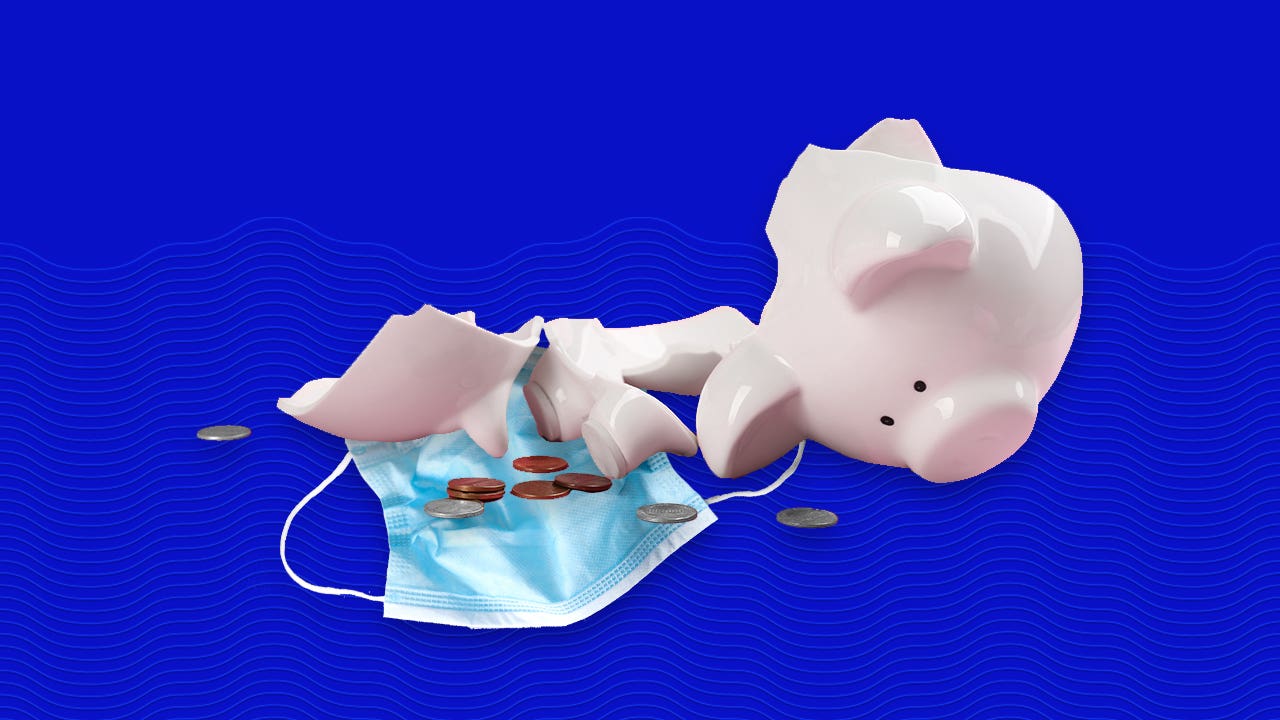 A broken piggy bank, some coins, and a face mask sit on a blue background