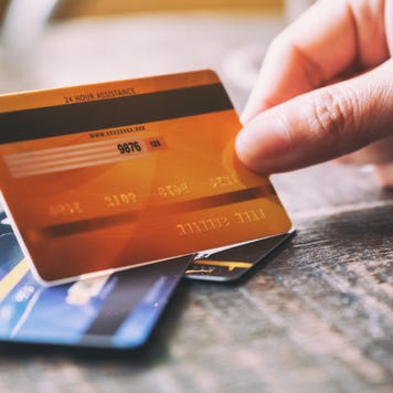 Person holding credit card