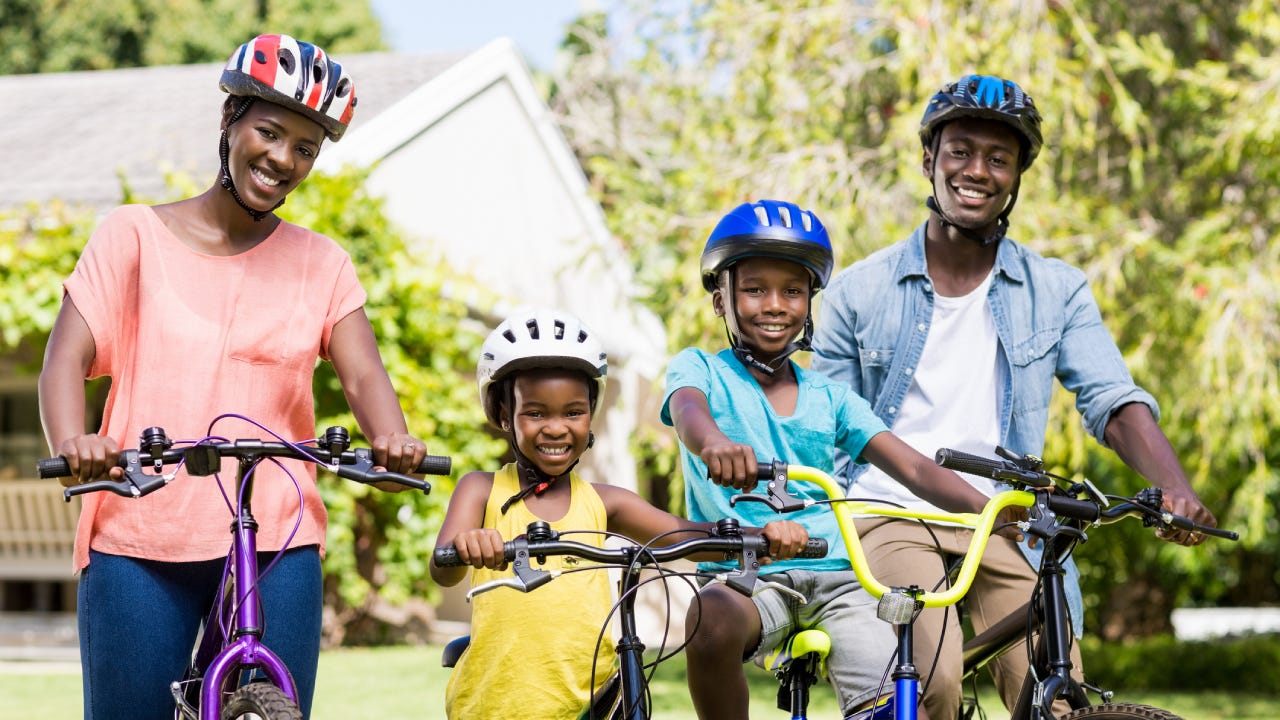 Happy family on bikes