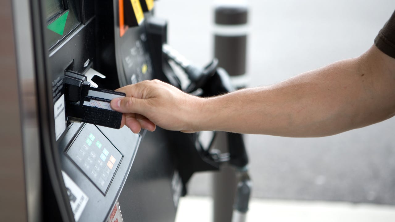 Person at gas pump