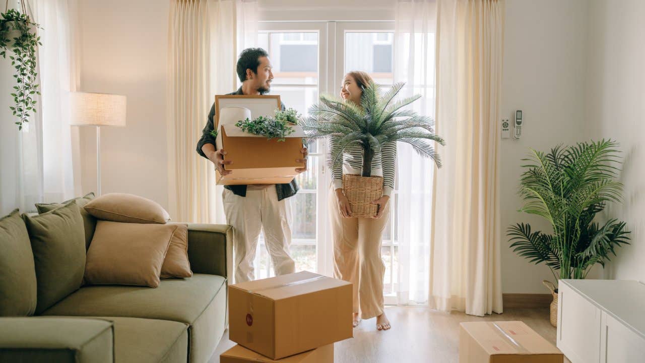 Asian couple moving new house