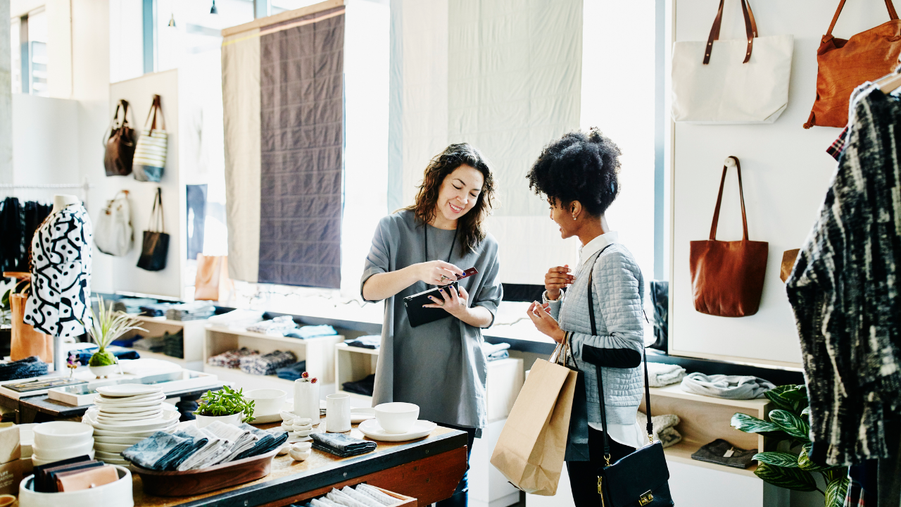 Woman paying for an item in a retail store