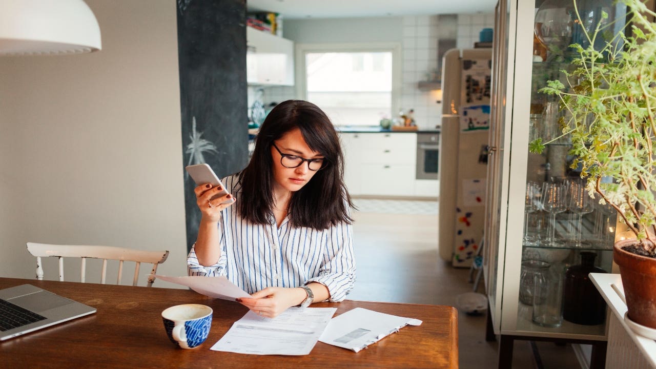 A woman considers her mortgage options.