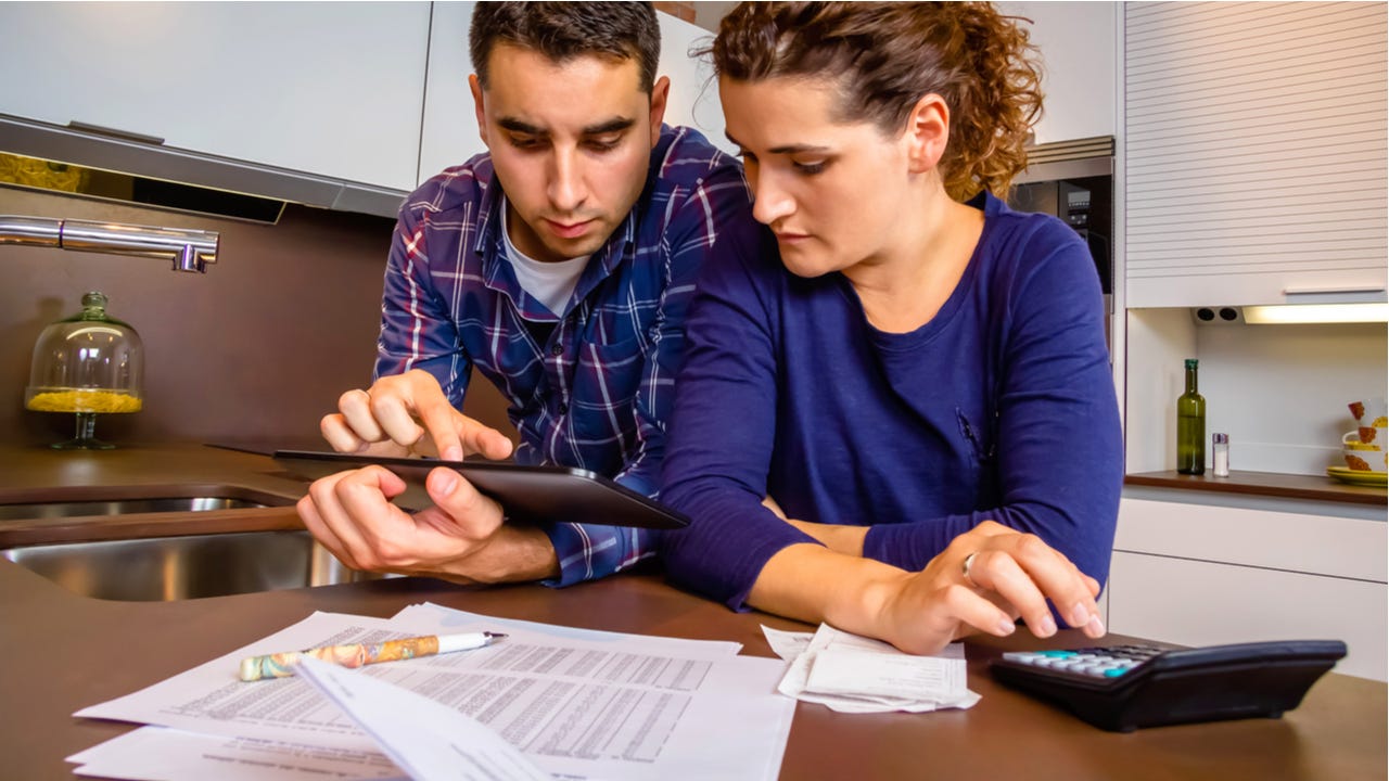 Couple works together on finances.