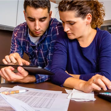 Couple works together on finances.
