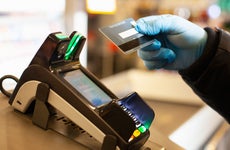 Person scanning credit card