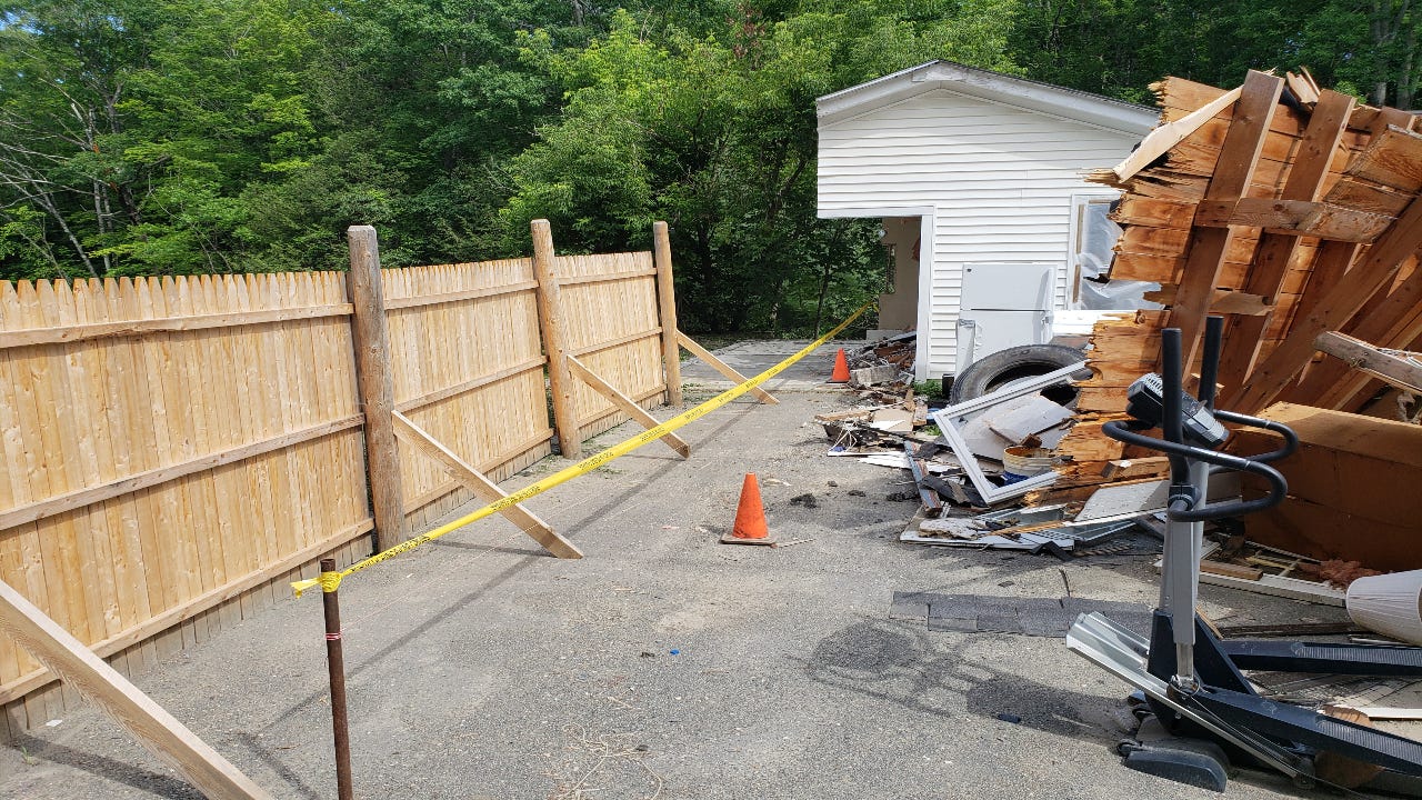 Garage sawed in half in Maine property dispute.