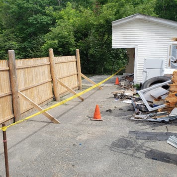Garage sawed in half in Maine property dispute.