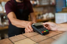 man paying with card