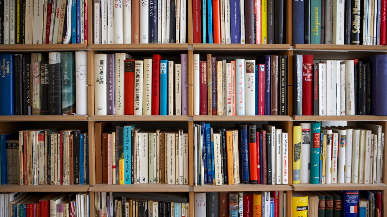Various books on shelves