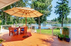 A backyard deck overlooking a river
