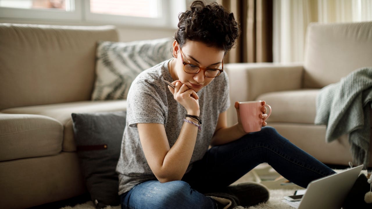 Young woman working at home