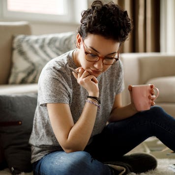 Young woman working at home