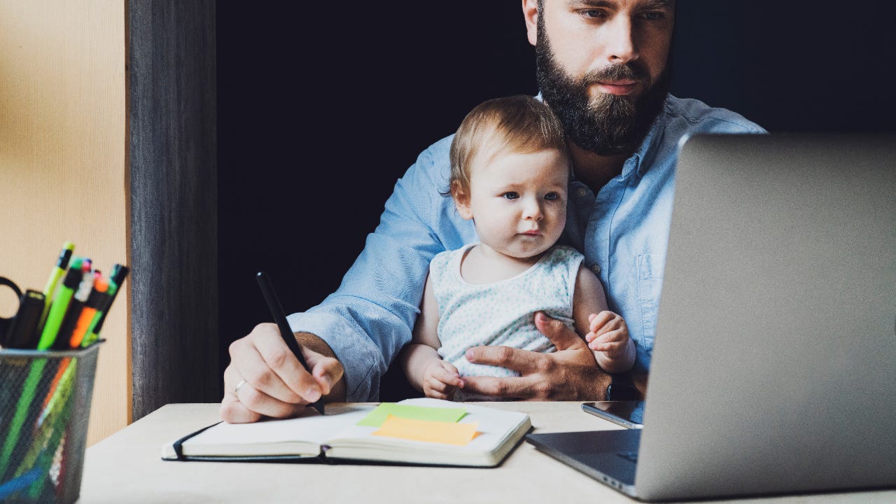 A father balances his finances with his daughter.