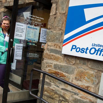 Customers near the door at a USPS location