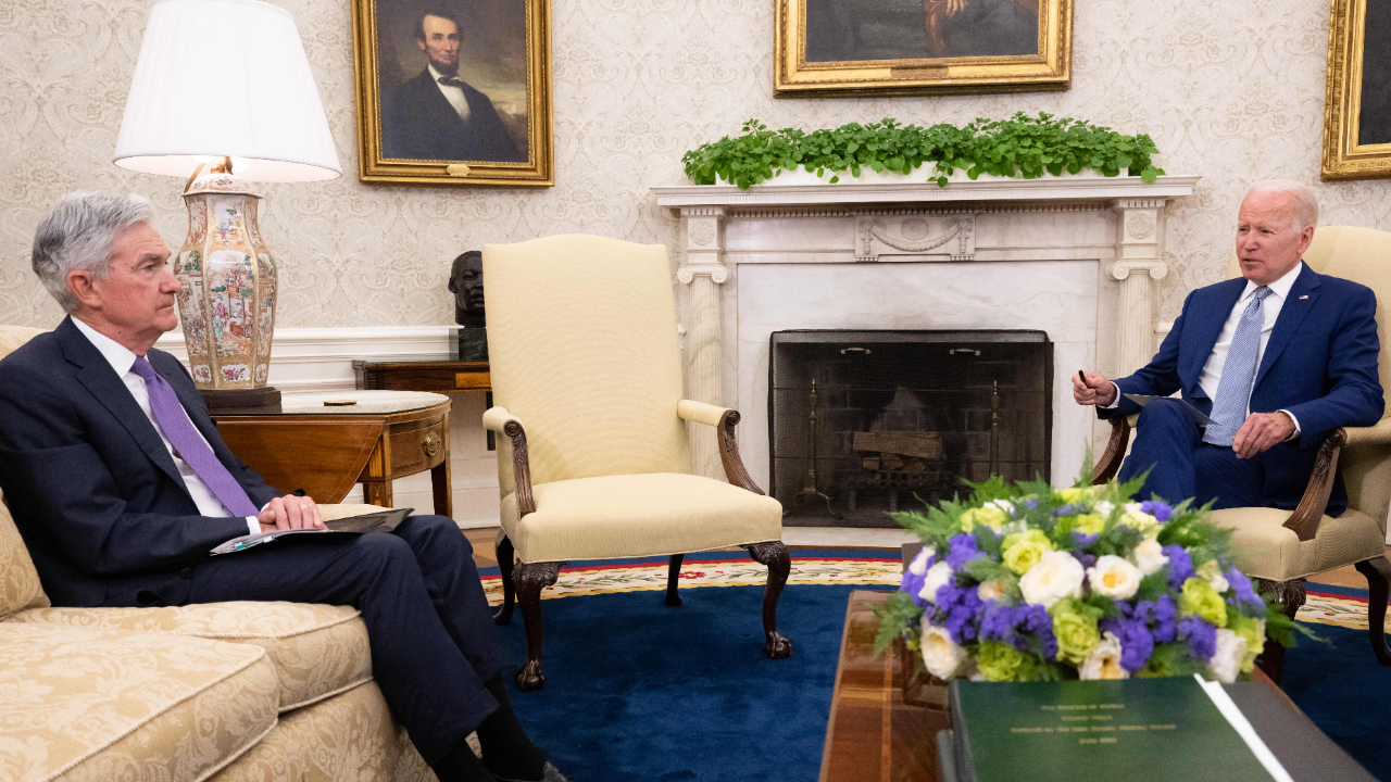 President Biden and Federal Reserve Chairman Jerome Powell sitting in the Oval Office