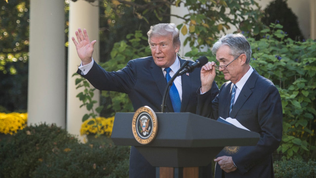 Donald Trump and Jerome Powell speaking from the White House Rose Garden