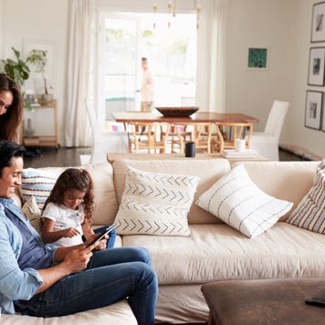 A family hangs out in their living room