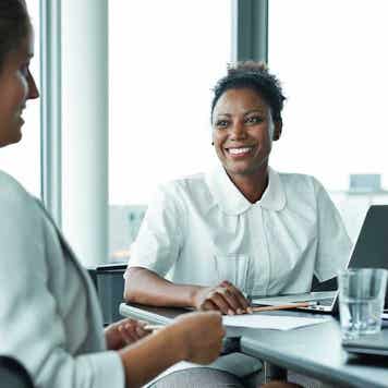 Two businesswomen having a meeting