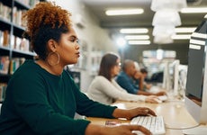 A woman participates in an online class