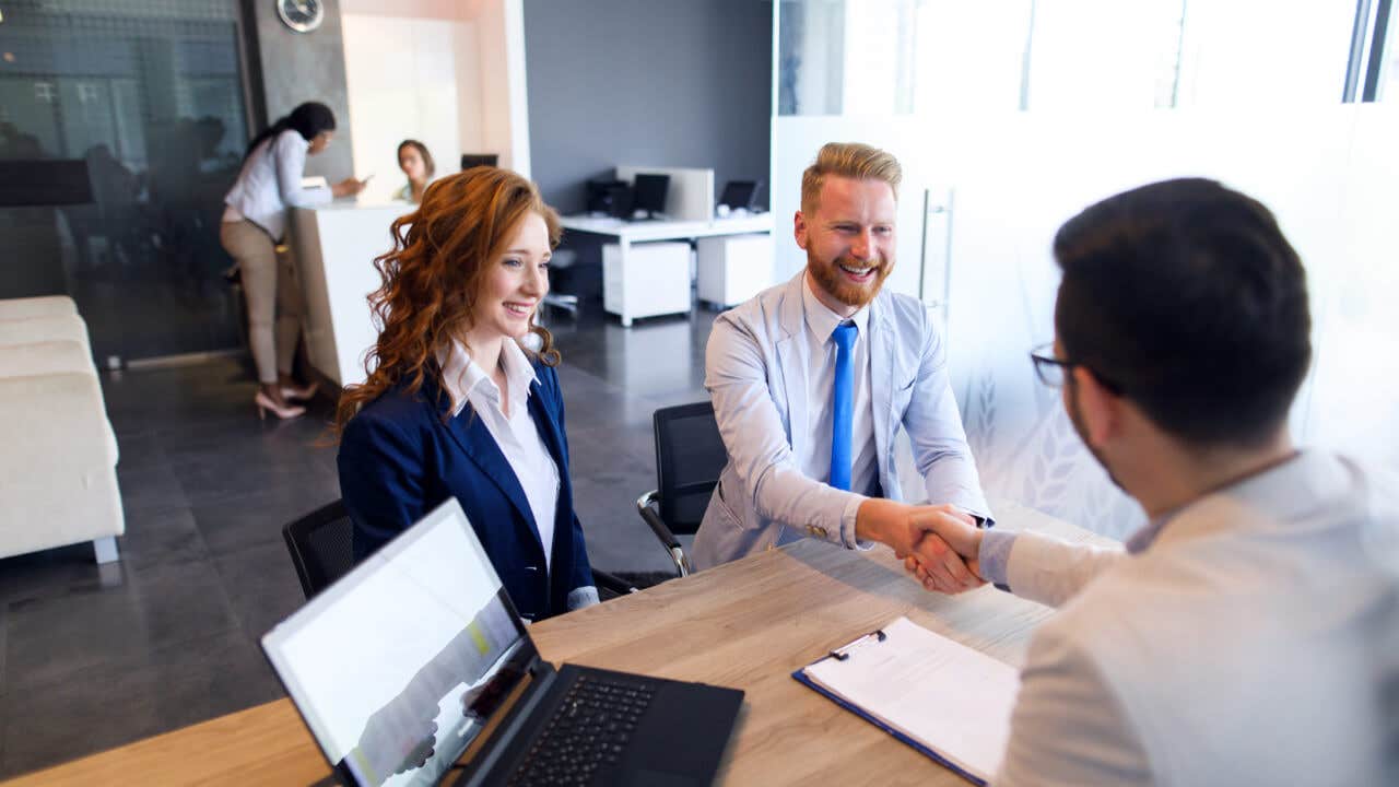 Couple meeting with loan officer