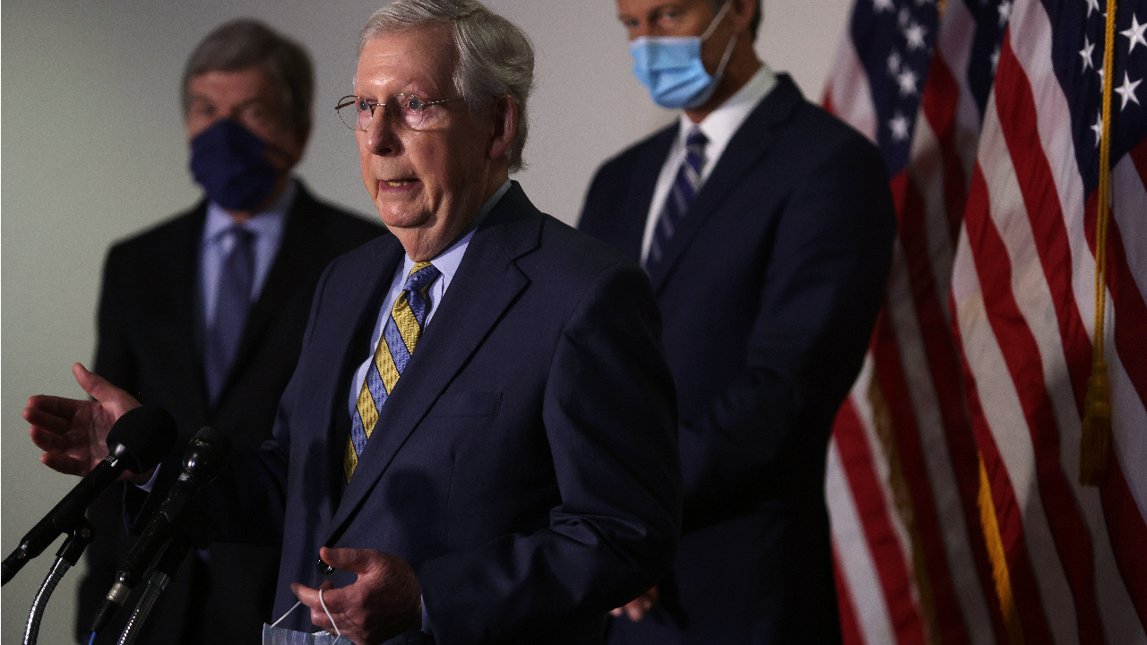 Sen. Mitch McConnell speaks to reporters
