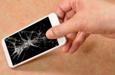 A smartphone with a cracked screen.